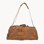 Brown duffel bag with a visible brand logo on a white background