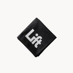 Black towel with 'Lift' logo on a white background